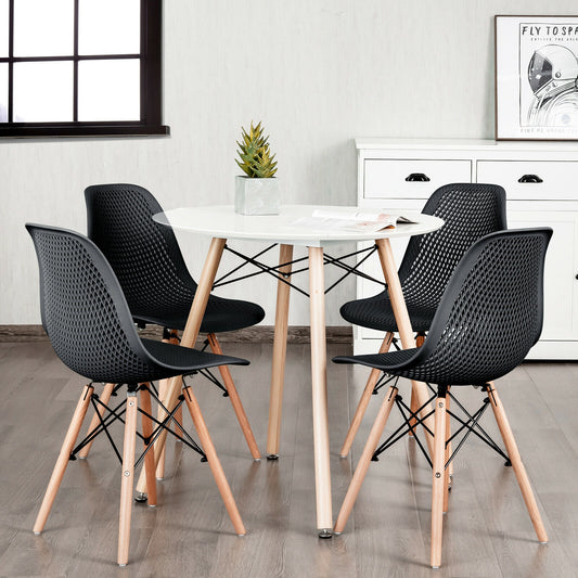 4-Piece Modern Plastic Hollow Chair Set, Wood Leg, Black Dining Chairs Black at Gallery Canada