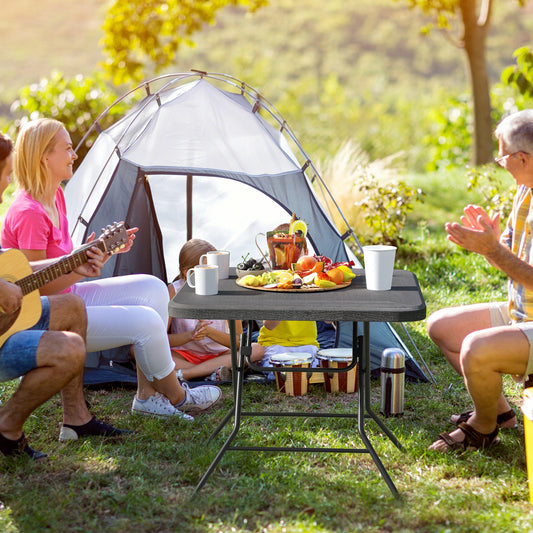 2.6FT Foldable Dining Table with Wood Grain HDPE Tabletop and Non-slip Foot Pads, Black Patio Dining Tables Black at Gallery Canada