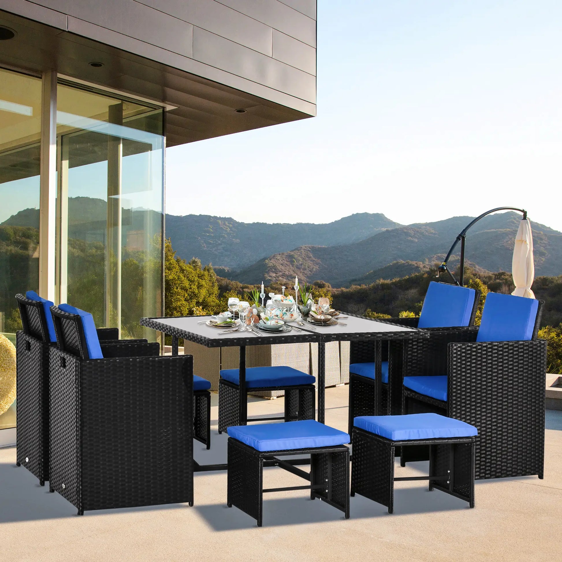 9-Piece Wicker Patio Dining Set, Glass Top Table, Ottomans, Blue Outdoor Dining Sets at Gallery Canada
