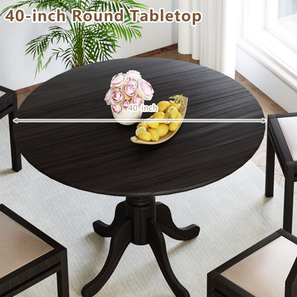 Wooden Dining Table with Round Tabletop and Curved Trestle Legs, Black Dining Tables at Gallery Canada