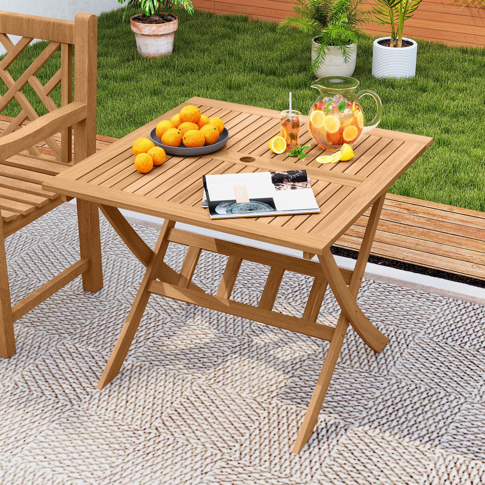 36-Inch Acacia Wood Folding Patio Dining Table with Umbrella Hole for 4 People Patio Dining Tables at Gallery Canada