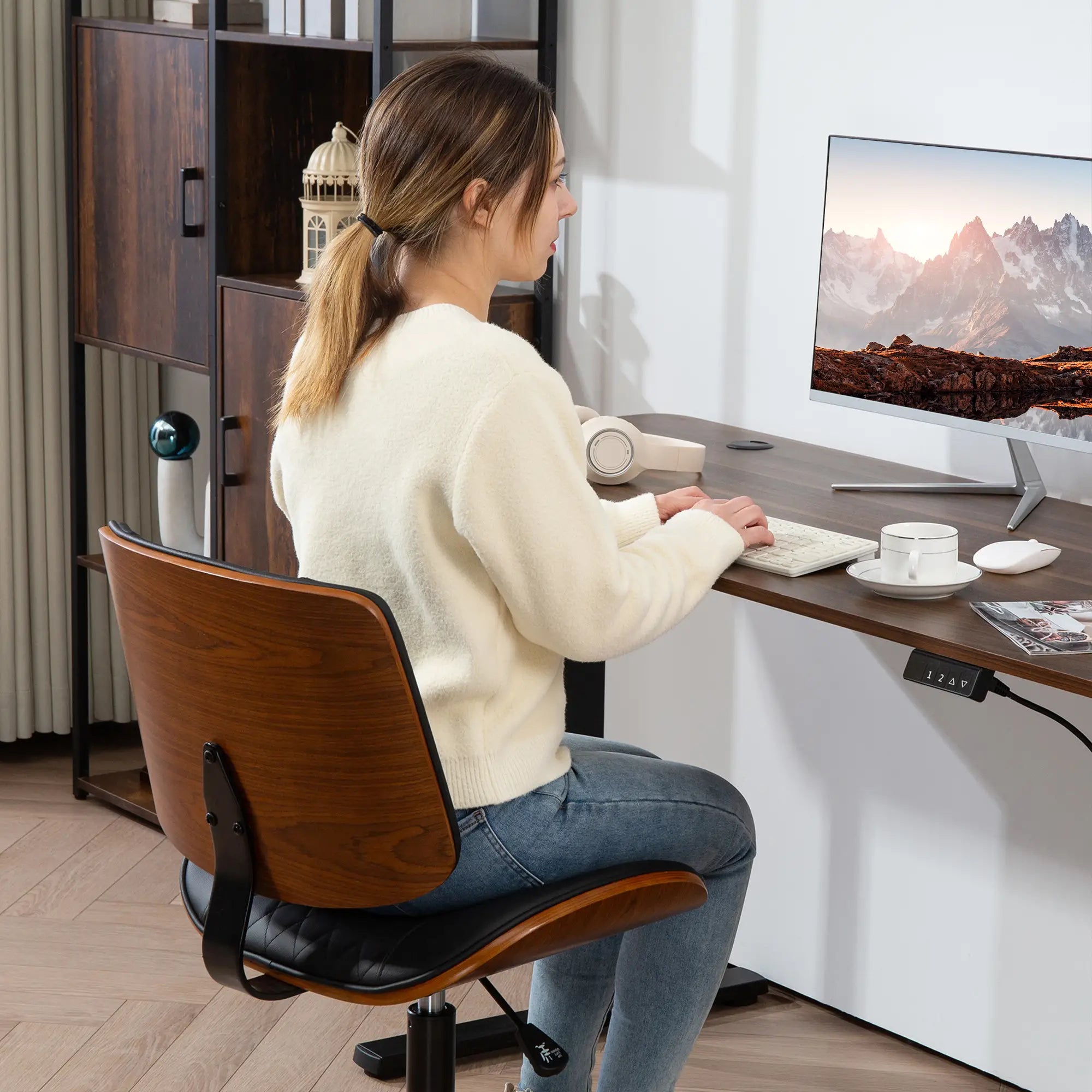 PU Leather Office Chair, Adjustable Height, Swivel Wheels, Black Office Chairs at Gallery Canada