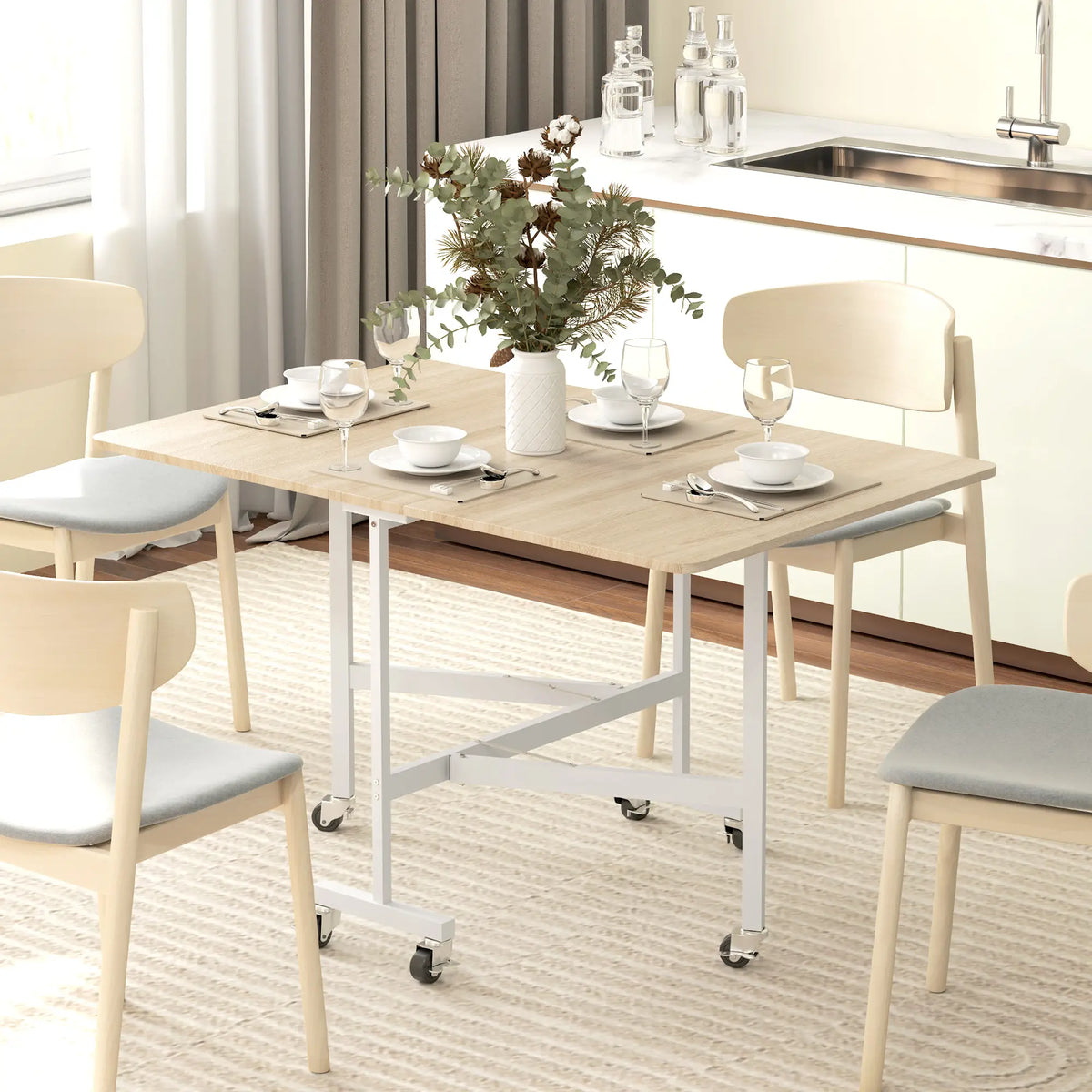 6-Seater Drop-Leaf Dining Table With Wheels, Oak Dining Tables at Gallery Canada