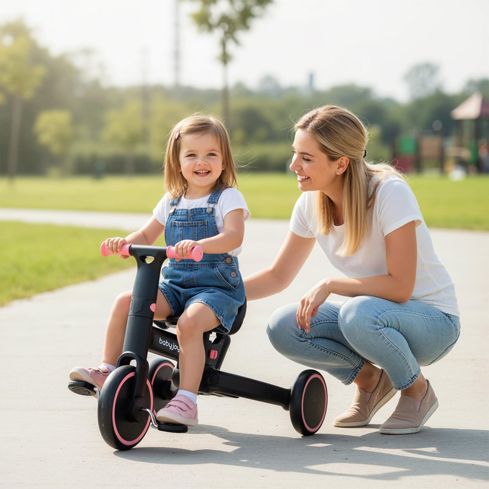 4-in-1 Foldable Toddler Tricycle with Push Handle with Adjustable Seat, Pink Balance Bikes at Gallery Canada