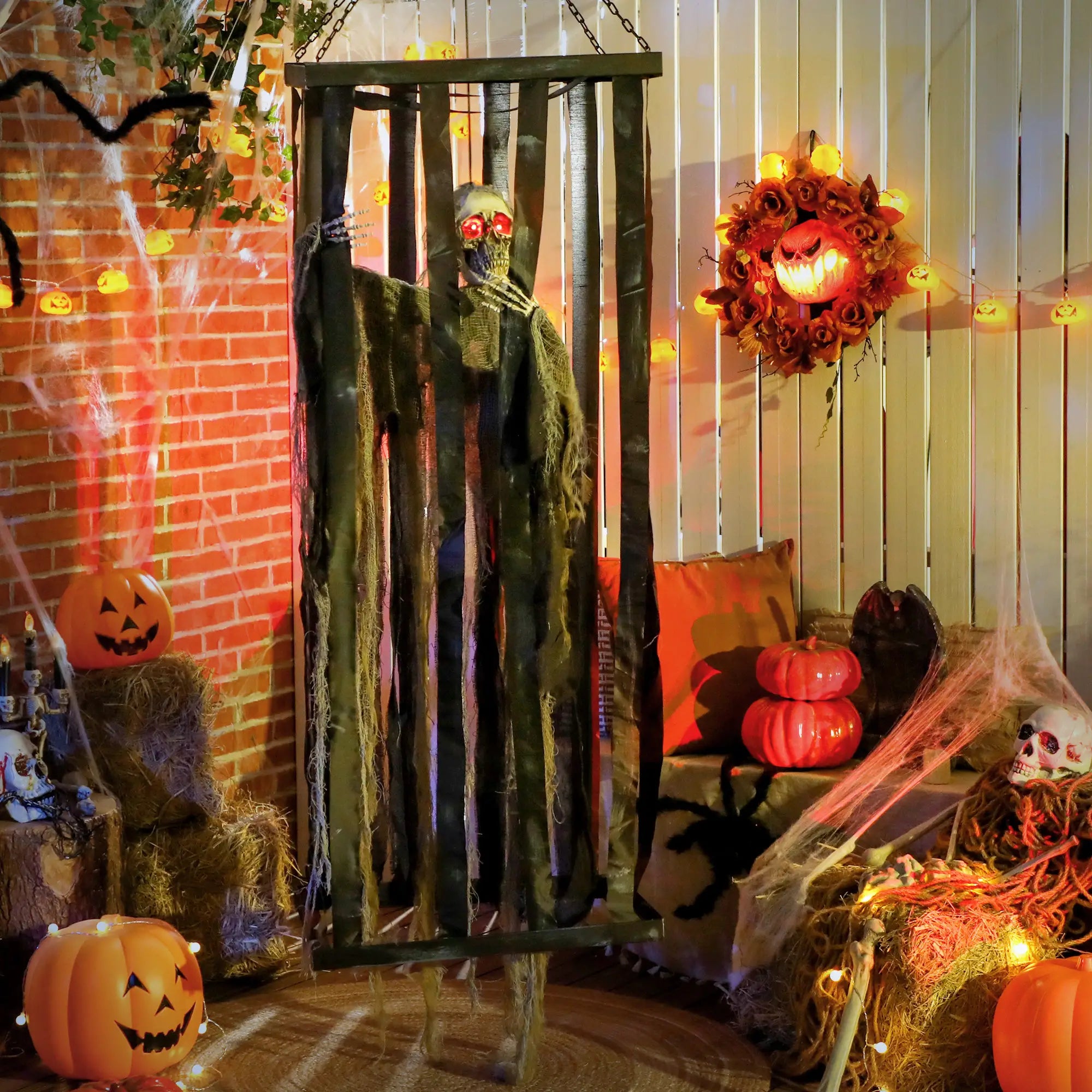 Animatronics Hanging Skeleton Reaper in Cage, Voice-Activated, Flashing Eyes Halloween Decorations at Gallery Canada