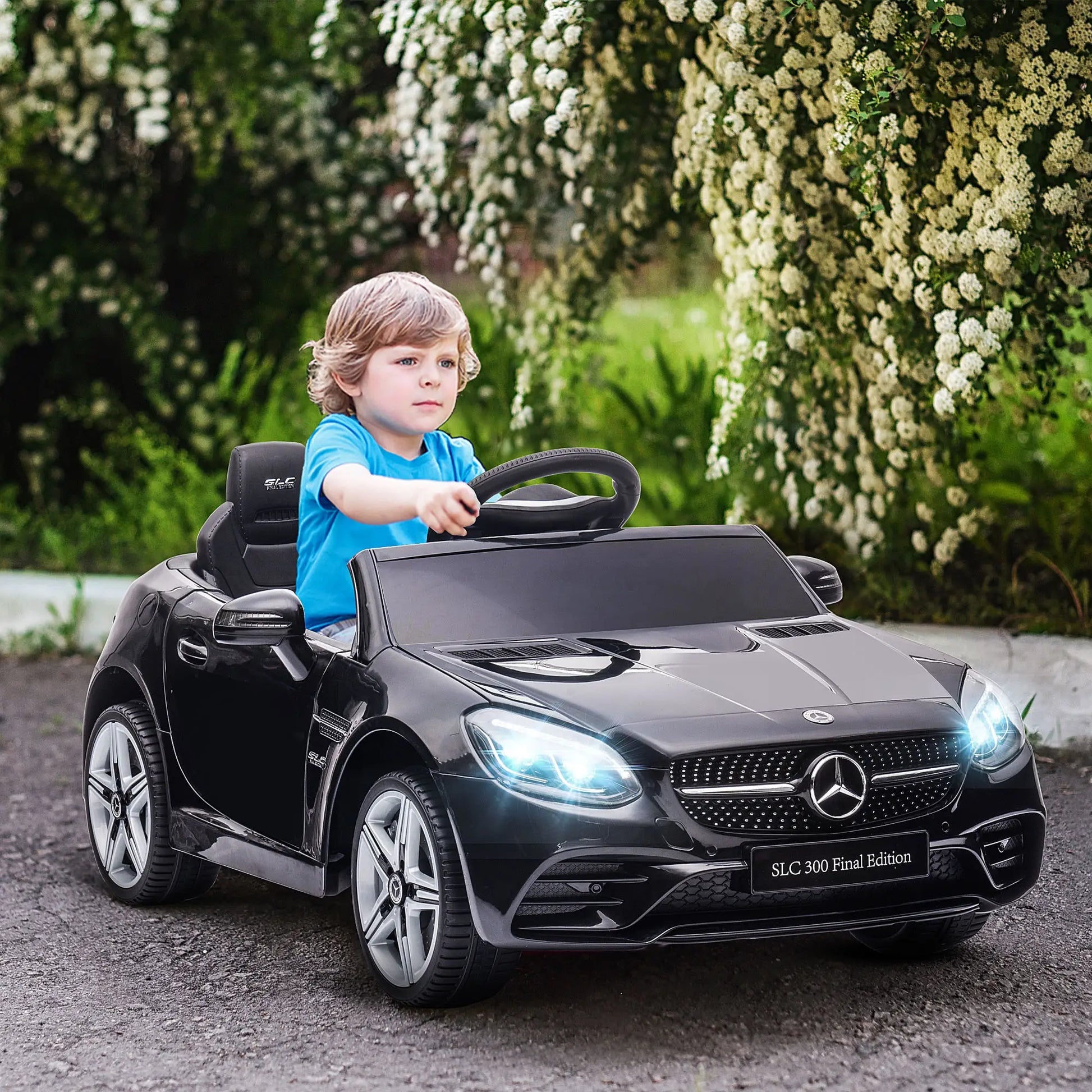 12V Ride On Car, Parent Remote Control, Two Motors, Music, Lights, Suspension Wheels, Black Electric Toy Cars at Gallery Canada