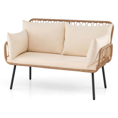 Chaise d'extérieur en rotin 2 places, coussins, pieds en métal, blanc cassé