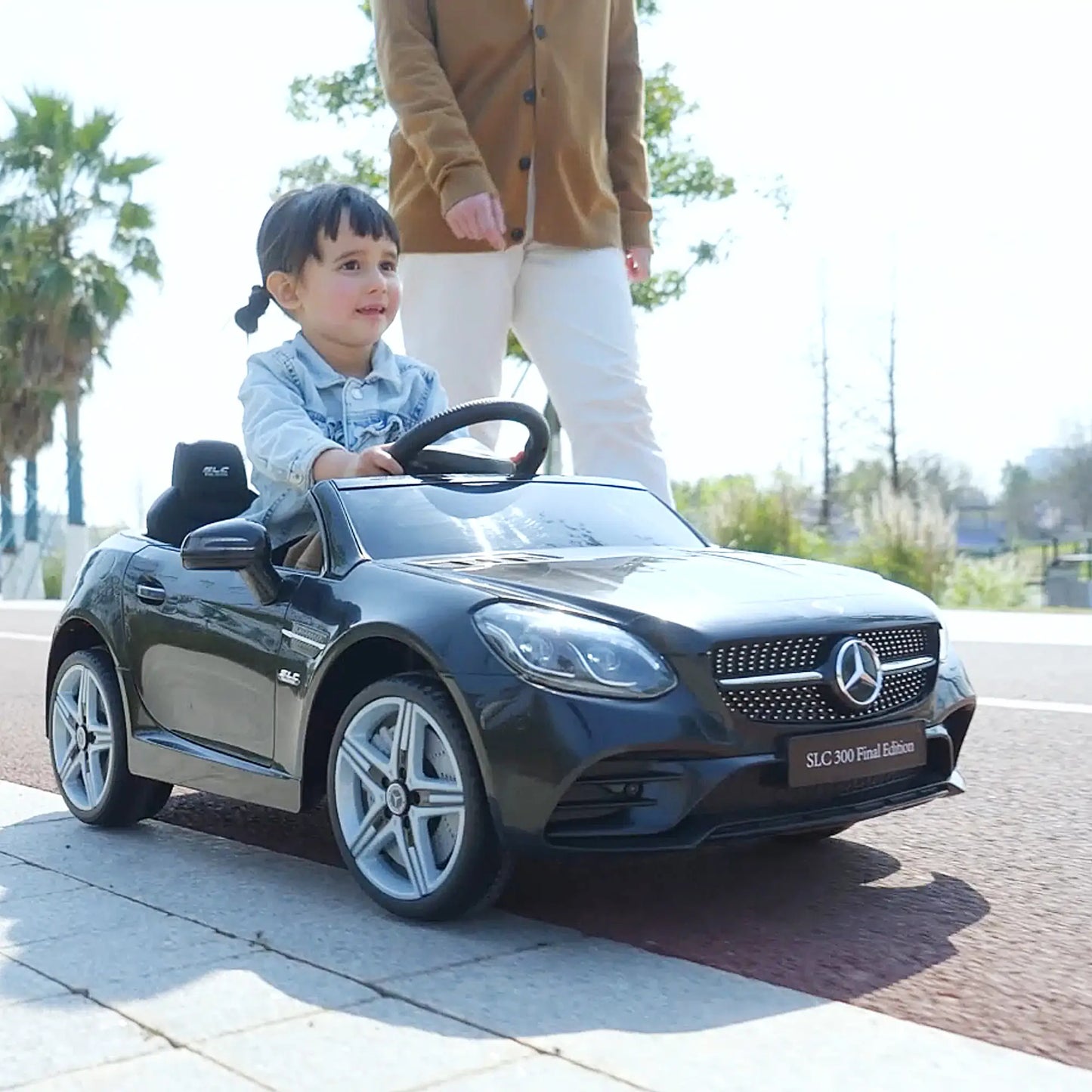12V Ride On Car, Parent Remote Control, Two Motors, Music, Lights, Suspension Wheels, Black Electric Toy Cars at Gallery Canada