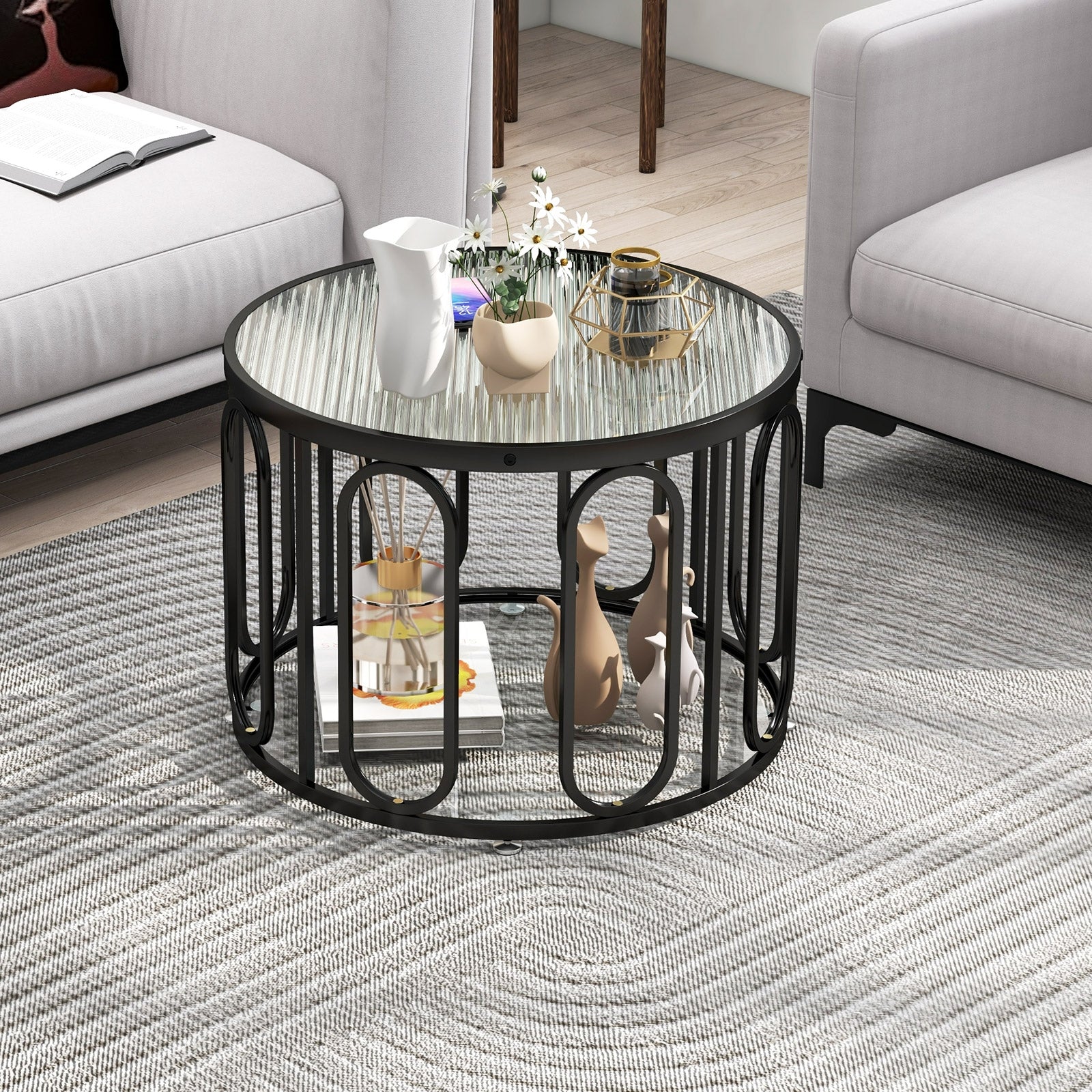 24 Inch Round Coffee Table with Reeded Tempered Glass Top and Oval Swivel Brackets, Black Coffee Tables at Gallery Canada