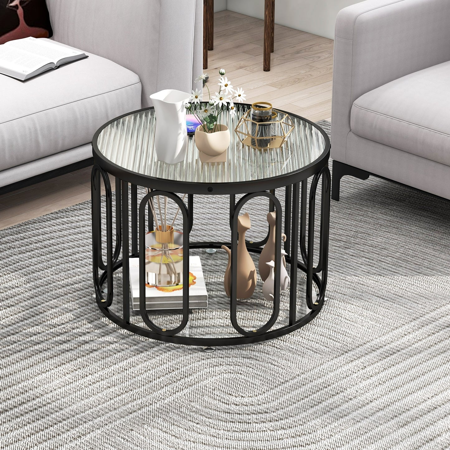 24 Inch Round Coffee Table with Reeded Tempered Glass Top and Oval Swivel Brackets, Black Coffee Tables at Gallery Canada