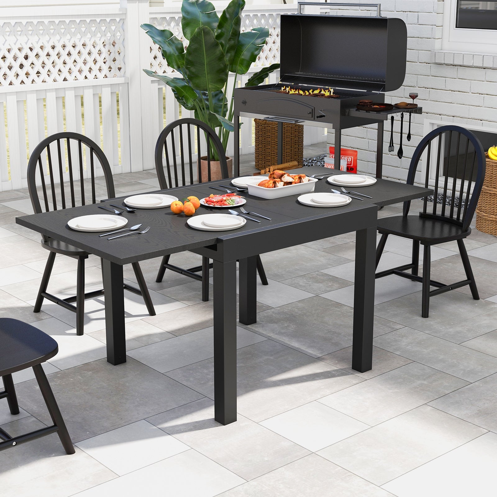 31.5 inches-63 inches Adjustable Patio Expandable Dining Table for 4-6 Person, Gray Dining Tables at Gallery Canada