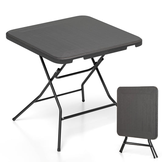 2.6FT Foldable Dining Table, Wood Grain HDPE Tabletop, Non-Slip Foot Pads, Black Patio Dining Tables Black at Gallery Canada