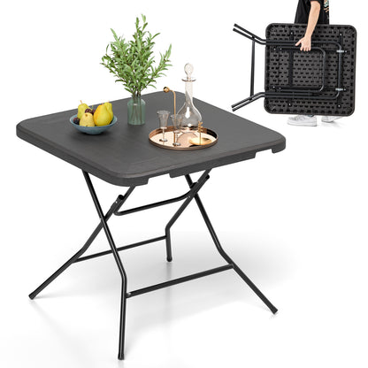 2.6FT Foldable Dining Table with Wood Grain HDPE Tabletop and Non-slip Foot Pads, Black Patio Dining Tables at Gallery Canada