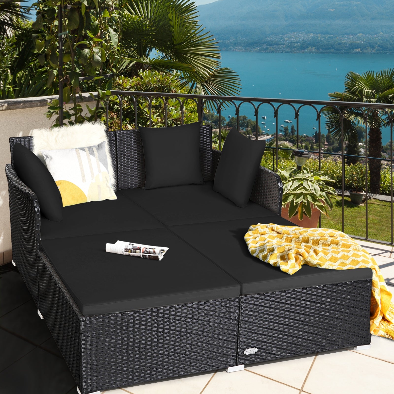 Spacious Outdoor Rattan Daybed with Upholstered Cushions and Pillows, Black Outdoor Sectionals at Gallery Canada