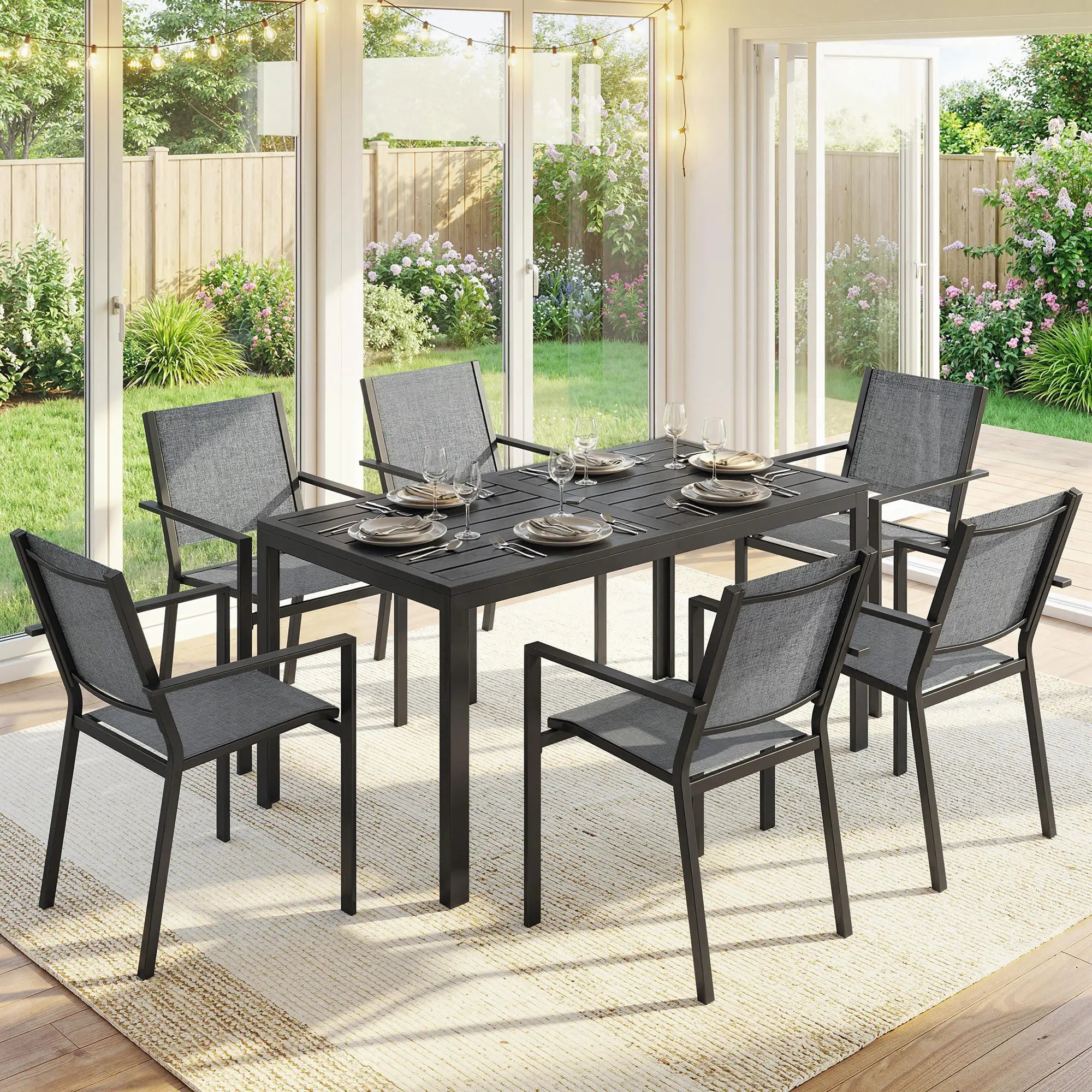 Outdoor Dining Set For 6, Black Metal Patio Table, Mesh Stackable Chairs, Black Outdoor Dining Sets at Gallery Canada