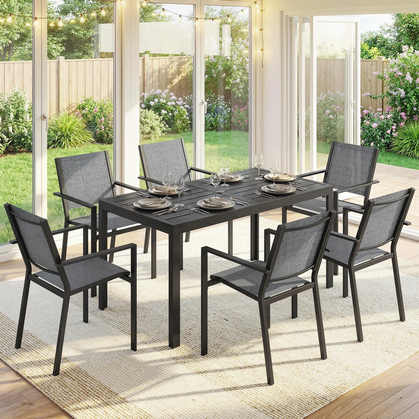 Outdoor Dining Set For 6, Black Metal Patio Table, Mesh Stackable Chairs, Black Outdoor Dining Sets at Gallery Canada