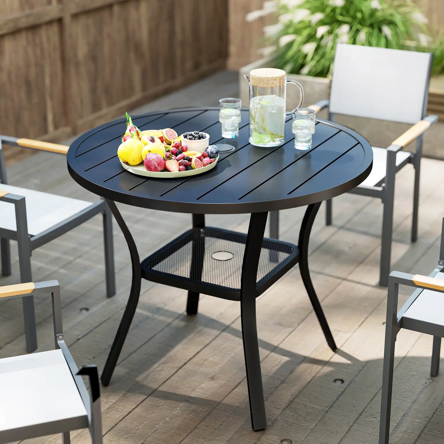 35.5" Round Outdoor Dining Table, Metal Patio Table With Umbrella Hole, Black Patio Dining Tables at Gallery Canada