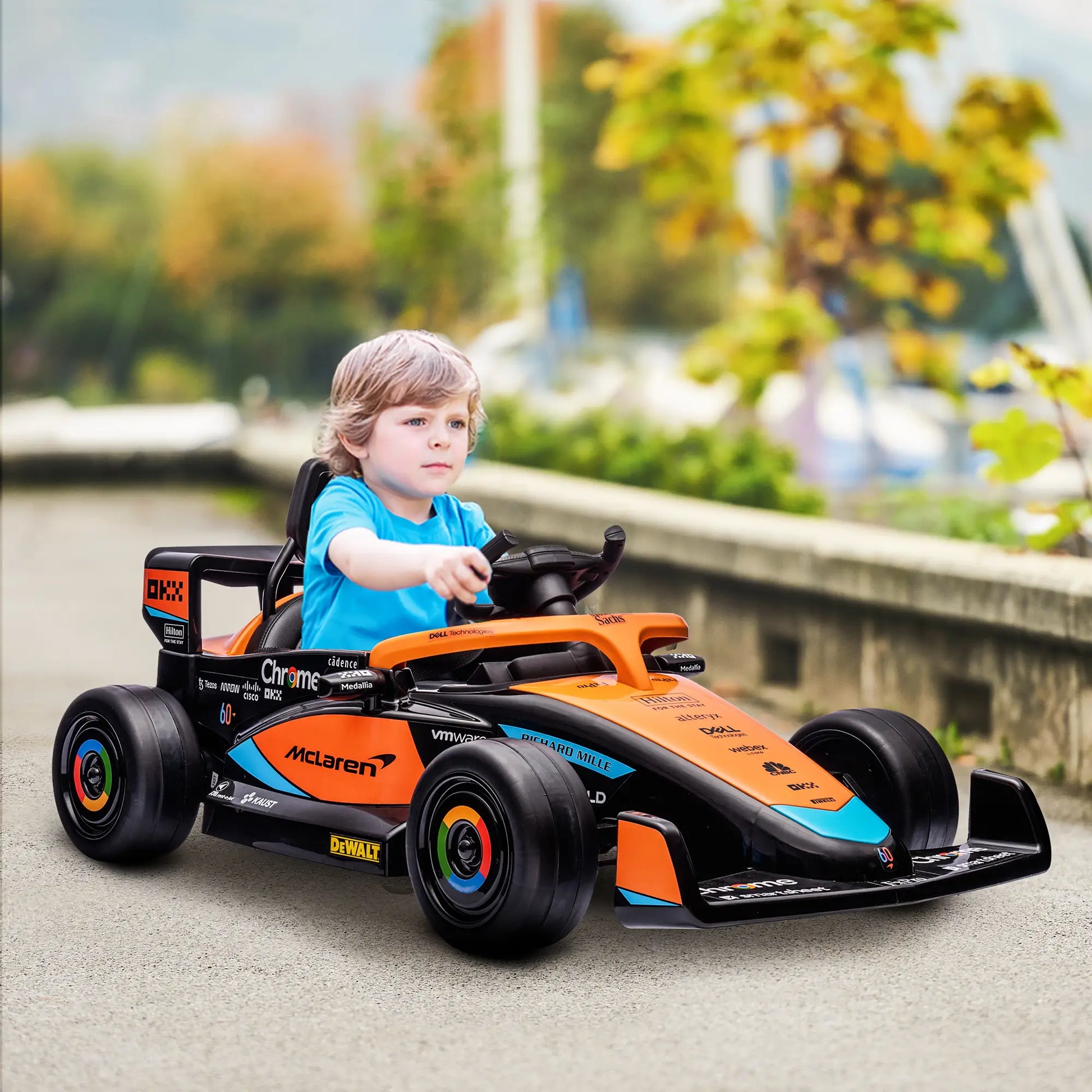 12V Electric Car For Kids, Suspension, Music, MP3, Remote Control, Orange Electric Toy Cars at Gallery Canada